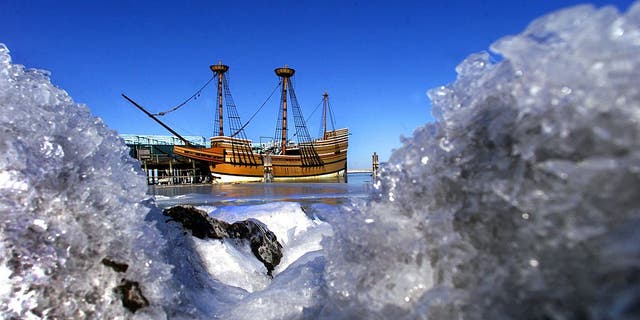 Plymouth, Massachusetts, January 22: Ice-covered rocks frame the Mayflower ll at its berth in Plymouth Harbor, frozen in place by ice-covered waters as the wind was blowing over 25 mph over the water, with the temperature in the low teens. The Pilgrims landed in Plymouth in late December 1620, at the start of a typically brutal Massachusetts winter.