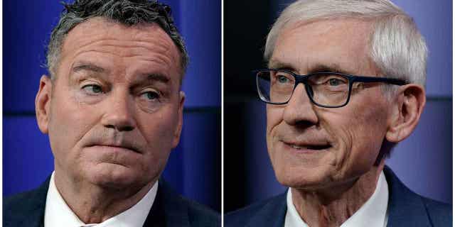 This combination of photos shows Wisconsin Republican gubernatorial candidate Tim Michels, left, and Democratic gubernatorial candidate Tony Evers before a televised debate on Oct. 14, 2022, in Madison, Wisconsin.