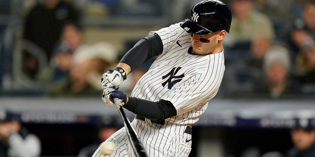 The New York Yankees' Anthony Rizzo connects for an RBI hit against the Houston Astros during the fourth inning of Game 4 of the American League Championship Series Oct. 23, 2022, in New York.
