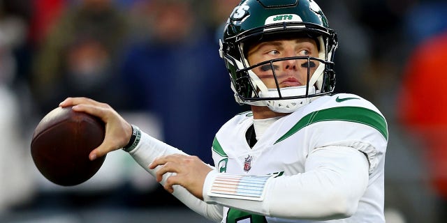 Zach Wilson, #2 of the New York Jets, throws a pass against the New England Patriots during the second half at Gillette Stadium on Nov. 20, 2022 in Foxborough, Massachusetts.