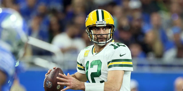 Green Bay Packers quarterback Aaron Rodgers (12) looks to pass the ball during an NFL football game between the Detroit Lions and the Green Bay Packers in Detroit, Michigan USA, on Sunday, November 6, 2022.