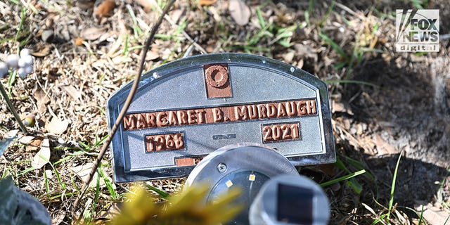 The temporary plastic plaque marking Maggie Murdaugh's grave at Hampton Cemetery, in South Carolina, 17 months after her husband, Alex Murdaugh, allegedly shot her and their 22-year-old son, Paul, to death. 