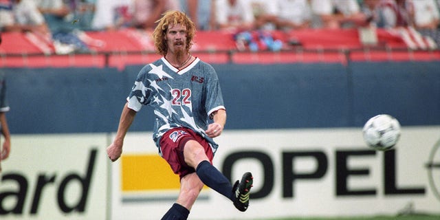 Alexi Lalas in action against Switzerland during a group stage match at the Pontiac Silverdome in Pontiac, Michigan on June 18, 1994.   