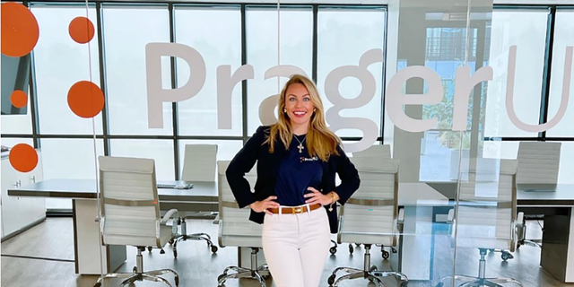 Annabella Rockwell poses for a photo at her new employer, PragerU.