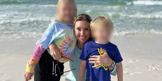 This photo released by the Dr. Beth Frost Memorial Fund shows Frost and her children, whose faces have been blurred.