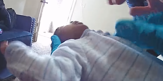 Body cam footage showing officer helping revive baby who stopped breathing. 