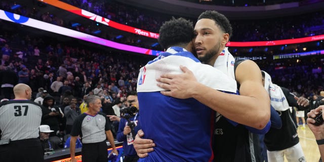 Ben Simmons, #10 of the Brooklyn Nets, and Tobias Harris, #12 of the Philadelphia 76ers after the game on November 22, 2022 at Wells Fargo Center in Philadelphia.