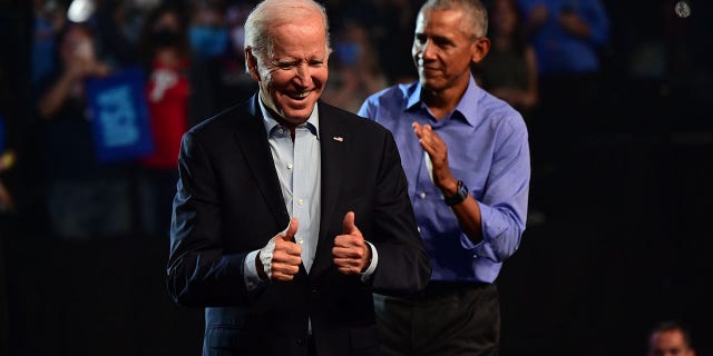 President Joe Biden and former President Barack Obama rally for Senate nominee John Fetterman and gubernatorial nominee Josh Shapiro at the Liacouras Center on Nov. 5, 2022, in Philadelphia.