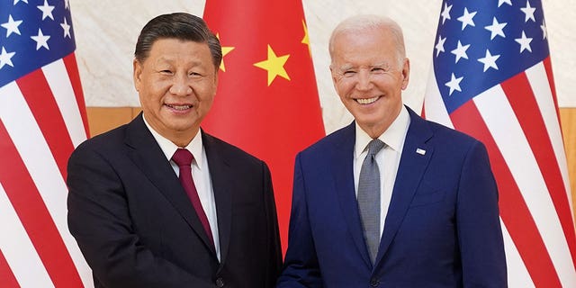 President Biden shakes hands with Chinese President Xi Jinping as they meet on the sidelines of the G20 leaders' summit in Bali, Indonesia, Nov. 14, 2022.