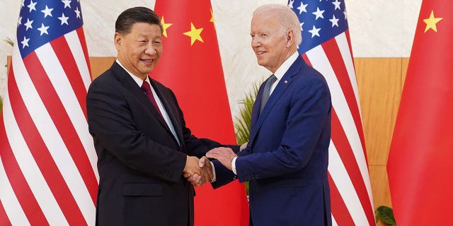 President Biden shakes hands with Chinese President Xi Jinping as they meet on the sidelines of the G20 leaders' summit in Bali, Indonesia, Nov. 14, 2022.