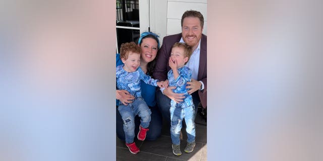 The Blicher boys are shown with their parents, Jamie and Brian.