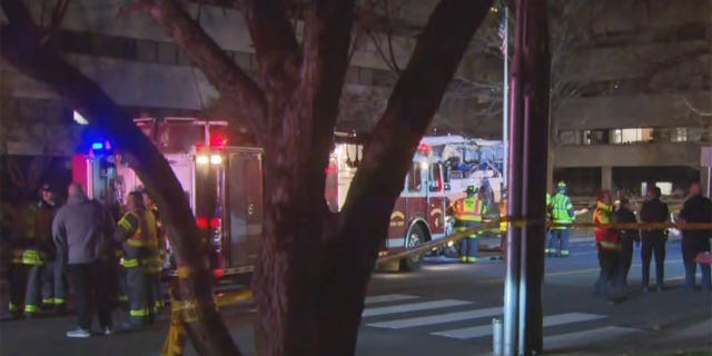First responders at the scene of a bus crash en route to Brandeis University from Boston. 