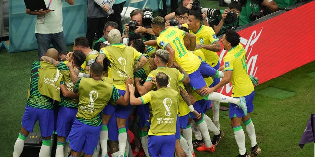 Richarlison of Brazil celebrates after scoring a goal during the FIFA World Cup Qatar 2022 Group G match between Brazil and Serbia at Lusail Stadium in Lusail City, Qatar on November 24, 2022.