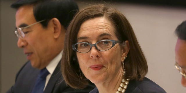 Gov. Kate Brown of Oregon attends a meeting in Seattle, Washington, on Sept. 22, 2015.