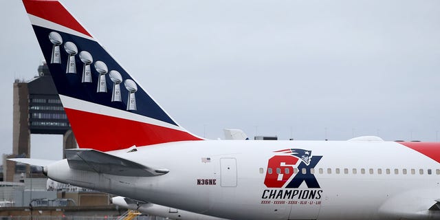 A New England Patriots aircraft delivers N95 masks from Shenzhen, China to Logan International Airport to slow the spread of the coronavirus (COVID-19) outbreak on April 2, 2020 in Boston, Massachusetts. 