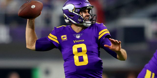 Kirk Cousins #8 of the Minnesota Vikings throws a pass against the New England Patriots during the second half at U.S. Bank Stadium on November 24, 2022 in Minneapolis, Minnesota.
