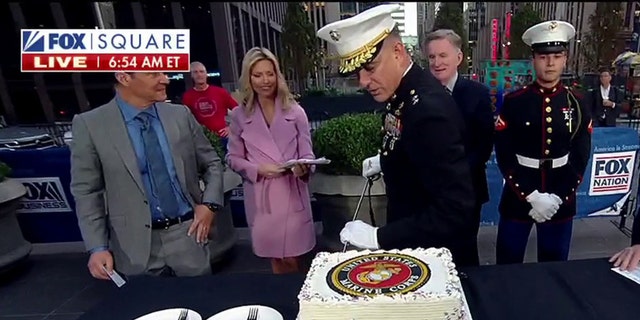 Major Gen. Francis Donovan cuts into the cake with the traditional Mameluke sword for the Marine Corps' anniversary on Nov. 10, 2022 during an appearance on "Fox and Friends."