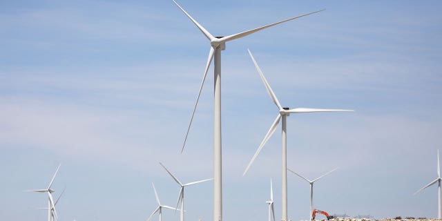 Wind turbines are photographed in Palm Springs, California.