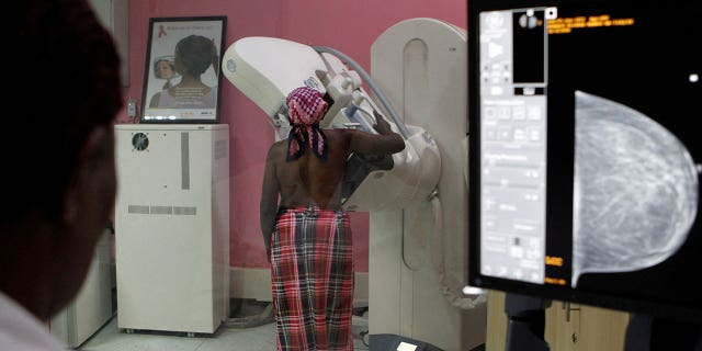 woman undergoing breast cancer screening