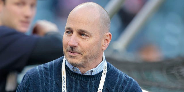 Brian Cashman antes del partido