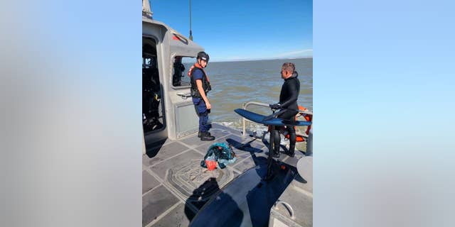 Two Coast Guard rescue vessels were dispatched to save the man, who floating near Galveston Bay without a life jacket. 