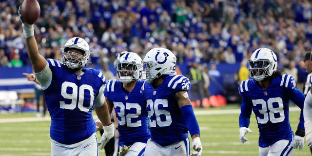 Grover Stewart of the Colts celebrates a recovered fumble against the Philadelphia Eagles at Lucas Oil Stadium on Nov, 20, 2022, in Indianapolis.