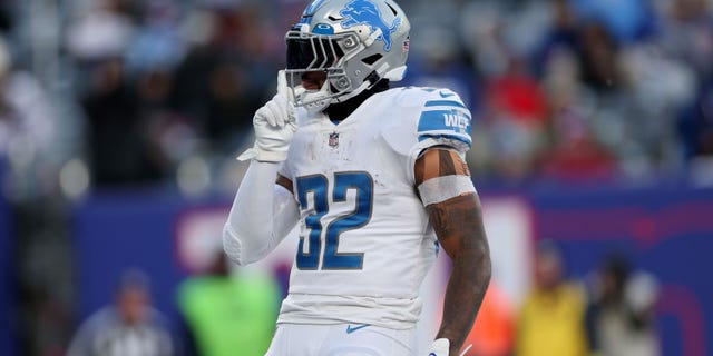 D’Andre Swift of the Detroit Lions reacts after scoring a touchdown against the New York Giants during the fourth quarter at MetLife Stadium on Nov. 20, 2022, in East Rutherford, New Jersey.