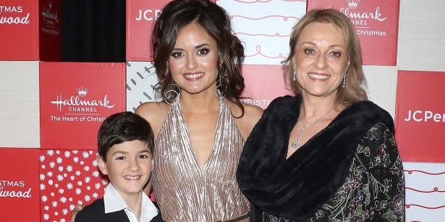 Danica McKellar, center, said she, her husband, her son, left, and her mother, right, have moved from L.A. to Tennessee.