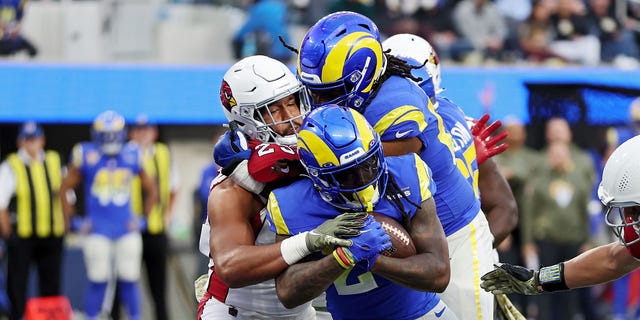 Darrell Henderson of the Los Angeles Rams, holding ball, scores a rushing touchdown in the third quarter of a game against the Arizona Cardinals at SoFi Stadium Nov. 13, 2022, in Inglewood, Calif.