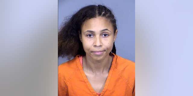 Desira Featchurs, 29, was arrested for endangerment and carrying a weapon on school grounds. 