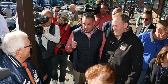 Anthony D'Esposito campaigning with Lee Zeldin. 