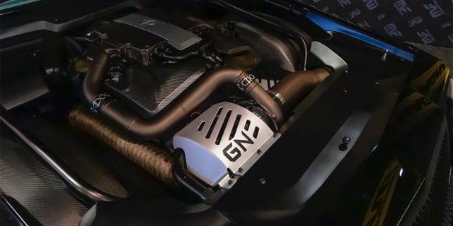 The modified engine is borrowed from a Cadillac, but features a Grand National-style sheild for its turbo. 