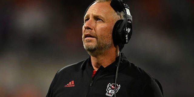 Head coach Dave Doeren of the North Carolina State Wolfpack stands on the sideline in the second quarter against the Clemson Tigers at Memorial Stadium Oct. 1, 2022 in Clemson, S.C.