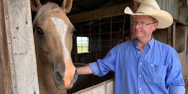 "I can't imagine living in a city with people all around me all the time," Clark said — adding that he likes "being around the cattle and horses all day."
