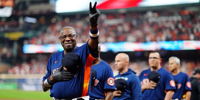 Manager Dusty Baker No.  12 of the Houston Astros watch during the national anthem prior to Game 6 of the 2022 World Series between the Philadelphia Phillies and the Houston Astros at Minute Maid Park on Saturday, November 5, 2022 in Houston, Texas. 