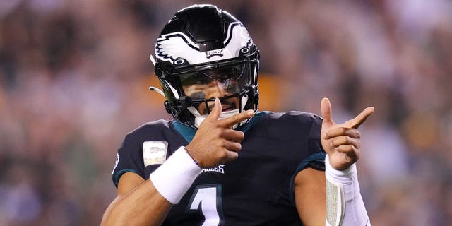 Jalen Hurts #1 of the Philadelphia Eagles celebrates after a 4-yard rushing touchdown run by Kenneth Gainwell #14 (not pictured) during the first quarter against the Green Bay Packers at Lincoln Financial Field on November 27, 2022 in Philadelphia, Pennsylvania.