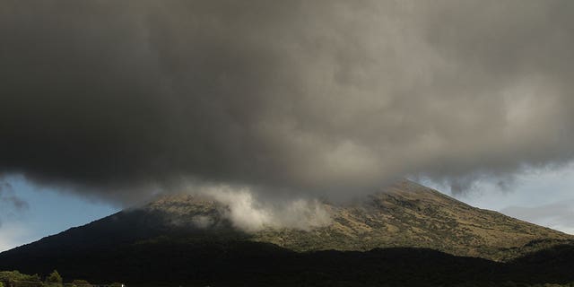 Clouds and gases surround the Chaparrastique volcano in San Jorge, El Salvador, on Nov. 28, 2022. 