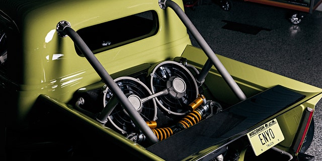 The radiator for its 1,000 horsepower engine is mounted in the bed.