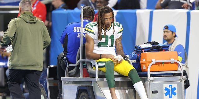 Green Bay Packers cornerback Eric Stokes (21) is taken off the field after an injury during the first half of a game against the Detroit Lions in Detroit Nov. 6, 2022.