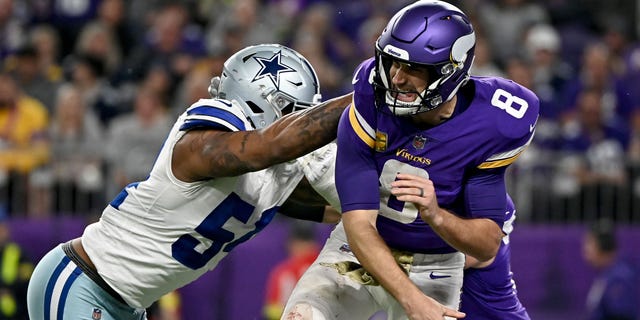 Kirk Cousins of the Minnesota Vikings is shown against the Dallas Cowboys during the second half at U.S. Bank Stadium on Nov. 20, 2022, in Minneapolis.