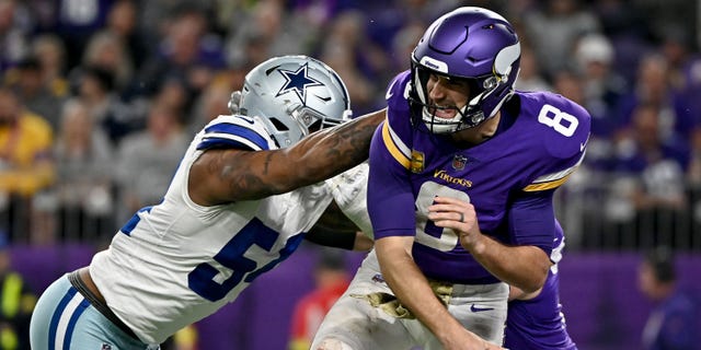 Kirk Cousins of the Minnesota Vikings is shown against the Dallas Cowboys during the second half at U.S. Bank Stadium on Nov. 20, 2022, in Minneapolis.