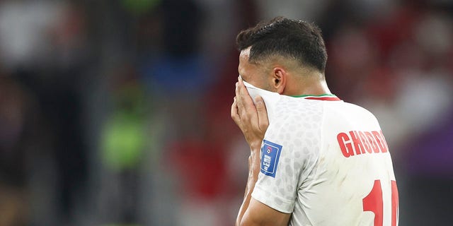 A dejected Saman Ghoddos of Iran as his team is eliminated from the FIFA World Cup in the group stage during a FIFA World Cup Qatar 2022 Group B match between Iran and USA at Al Thumama Stadium on November 29, 2022 in Doha, Qatar