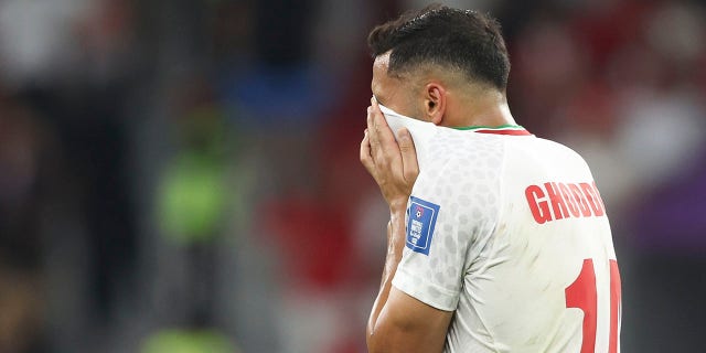 A dejected Saman Ghoddos of Iran as his team is eliminated from the FIFA World Cup in the group stage during a FIFA World Cup Qatar 2022 Group B match between Iran and USA at Al Thumama Stadium on November 29, 2022 in Doha, Qatar