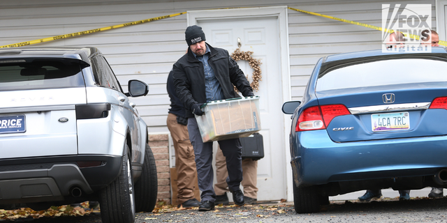 Investigators search a home in Moscow, Idaho on Monday, November 14, 2022 where four University of Idaho students were killed over the weekend in an apparent quadruple homicide. The victims are Ethan Chapin, 20, of Conway, Washington; Madison Mogen, 21, of Coeur d'Alene, Idaho; Xana Kernodle, 20, of Avondale, Idaho; and Kaylee GonCalves, 21, of Rathdrum, Idaho.