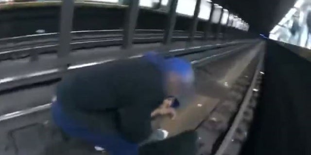 NYPD officers captured on video saving man from oncoming subway train ...