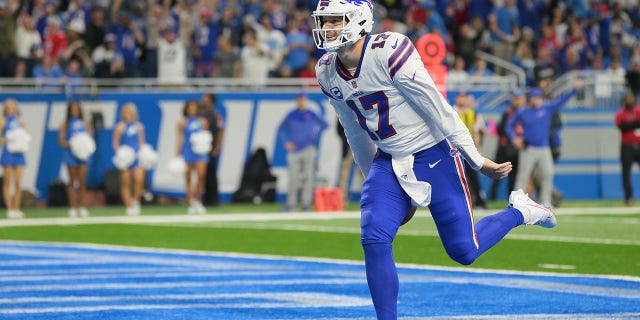 Buffalo Bills quarterback Josh Allen, #17, scores a touchdown during the first half of an NFL football game between the Detroit Lions and the Buffalo Bills in Detroit, Michigan USA, on Thursday 24, 2022.