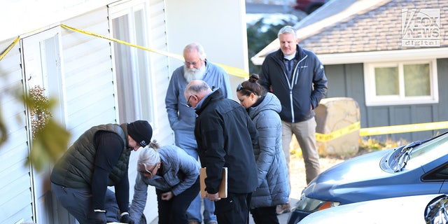 Idaho university murders: Prosecutor seen entering house where four students were stabbed to death