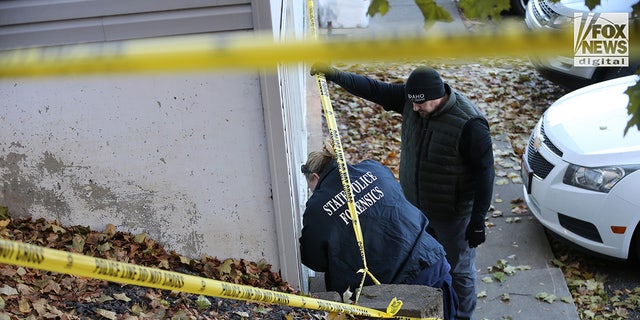 State police forensics investigators look for clues in Moscow, Idaho, on Nov. 21, 2022. Four University of Idaho students were slain Nov. 13 in the house.