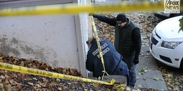 State police forensics investigators look for clues in Moscow, Idaho, on Nov. 21, 2022. Four University of Idaho students were slain Nov. 13 in the house.