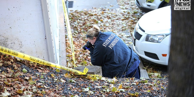 State police forensics look for clues in Moscow, Idaho on Monday, November 21, 2022. Four University of Idaho students who were slain on November 13 in this house.
